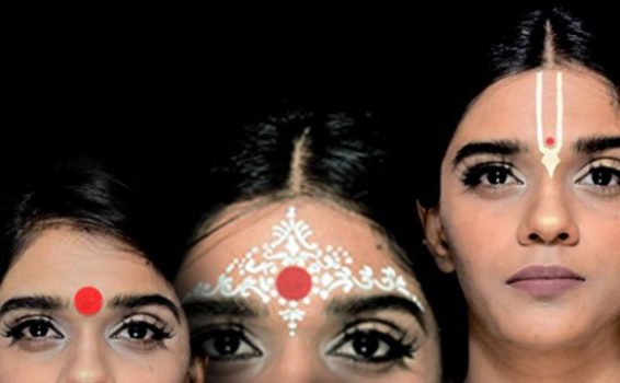 15_5360 a group of women showing different styles of bindi