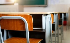 Empty classroom with chairs and desks