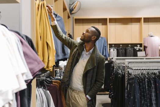 Stylish man shopping in a clothes store - Christian Nationalists want to seize your Sundays