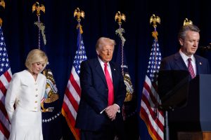 WASHINGTON, DC - FEBRUARY 06: (L-R) Televangelist Paula White and U.S. President Donald Trump bow their heads in prayer as Rep. Ben Cline (R-VA) (R), speaks at the National Prayer Breakfast sponsored by the The Fellowship Foundation at the Washington Hilton on February 06, 2025 in Washington, DC. The National Prayer Breakfast brings together members of Congress and leaders in fellowship and business for prayer and discussion.