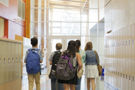 Students walking in corridor