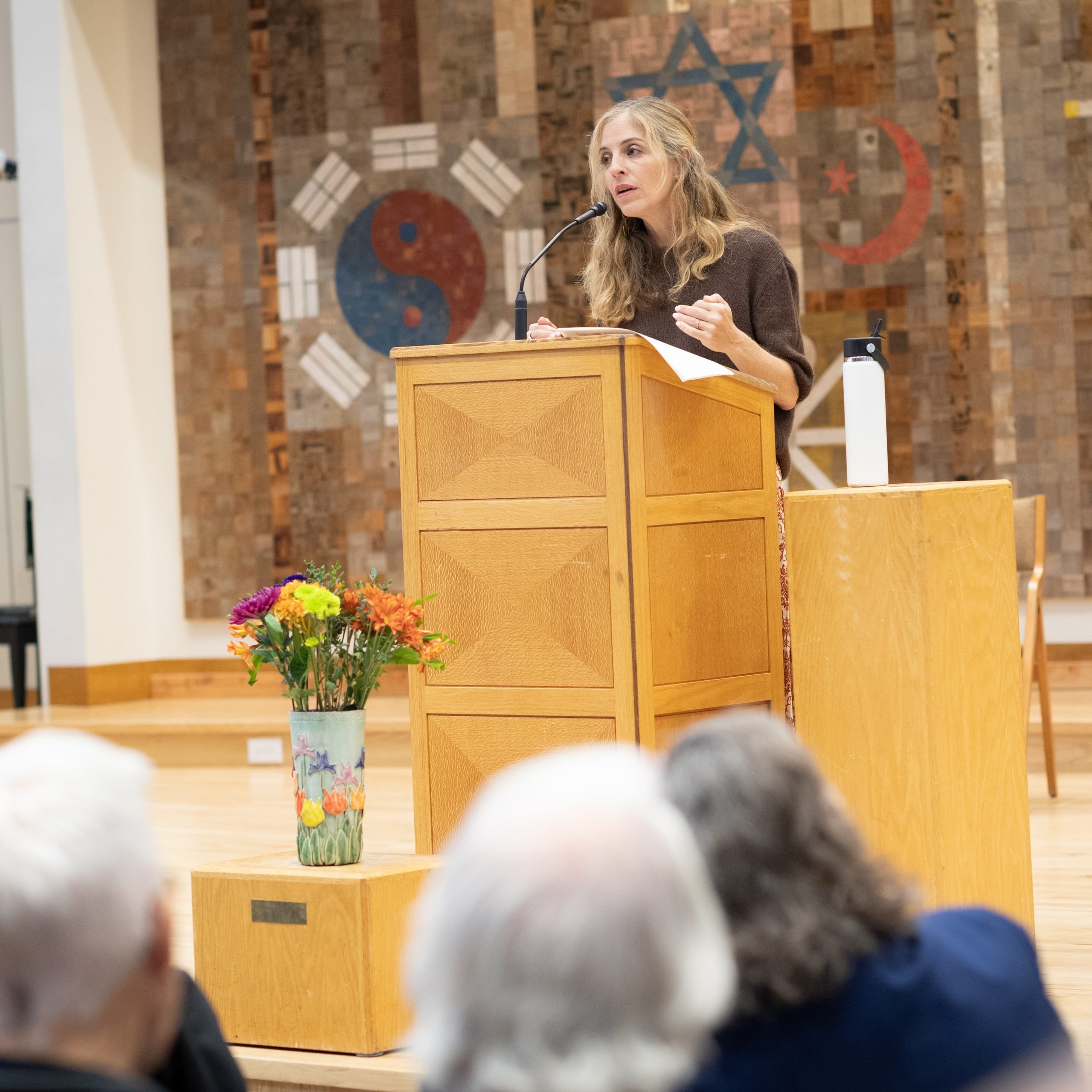Rachel Laser speaking at a community event