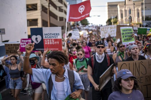 AUSTIN, TX -JUNE 25 : Protesters march in the street during an abortion-rights rally on June 25, 2022 in Austin, Texas. The Supreme Court's decision in Dobbs v Jackson Women's Health overturned the landmark 50-year-old Roe v Wade case and erased a federal right to an abortion. (Photo by Sergio Flores/Getty Images)